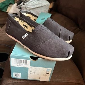 Toms, black slip on size 10. Brand new